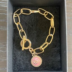 Vintage bracelet. Gucci stamped charm on 7 inch chain.